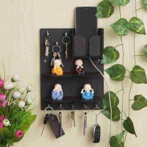 wooden wall mounted key holder and organizer with decorative figurines
