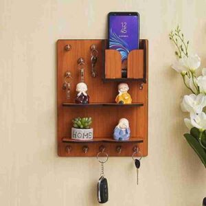 wooden wall mounted key holder and organizer with decorative figurines